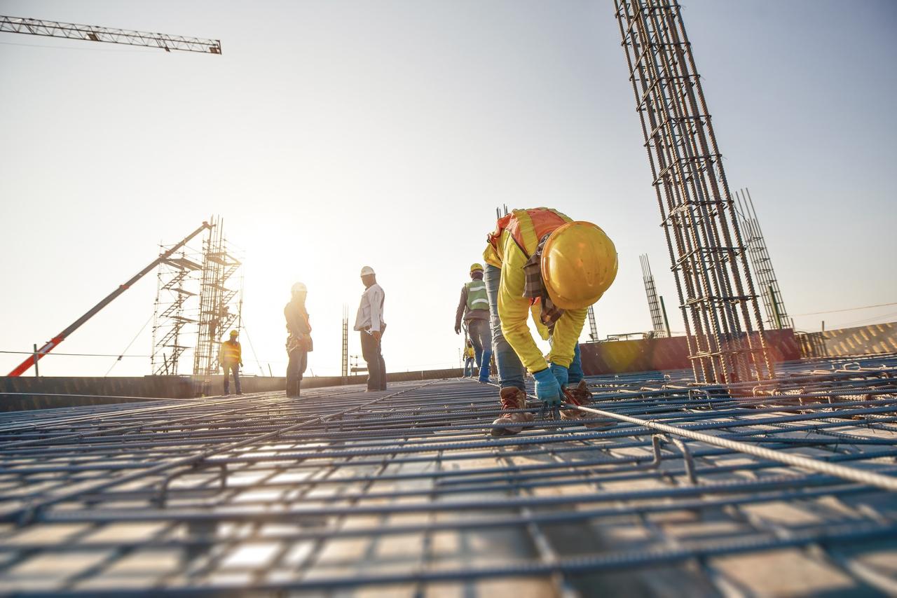 Construction team on roof | LetsBuild